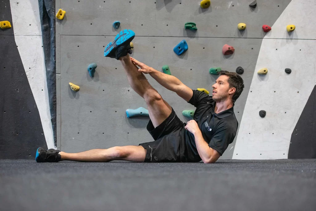 Stretches For Climbing: Best Techniques! 6. Side crunch with raised side leg
